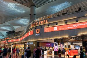 Istambul Airport Duty free shop in the departure hall of Istanbul International Airport with shops and passengers rushing to the gates